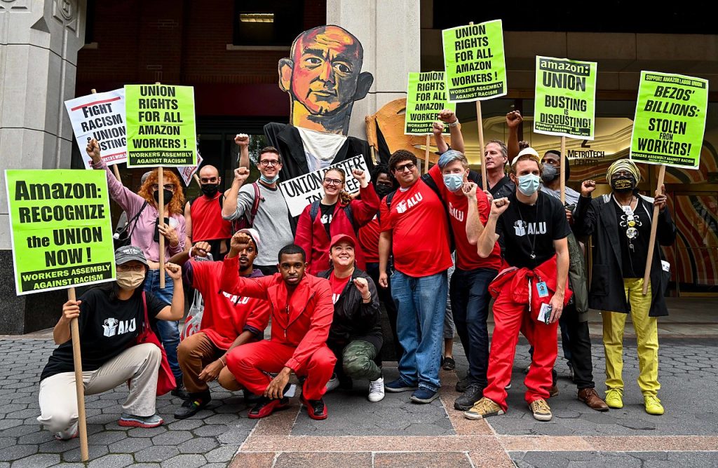 Amazon warehouse workers at four Amazon warehouses on Staten Island rallied outside the National Labor Relations Board and hand-carried four plastic containers filled with signed cards into a local labor office, petitioning it to authorize a union vote. New York City, New York, U.S. October 25, 2021